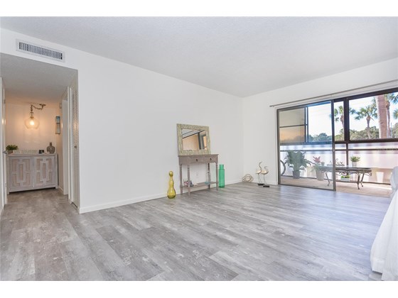 Beautiful luxury vinyl plank flooring throughout - Condo for sale at 66 Boundary Blvd #280, Rotonda West, FL 33947 - MLS Number is D6122649