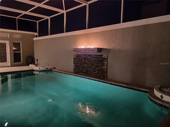 Pool fire feature and lighting - Single Family Home for sale at 345 7th Ave N, Tierra Verde, FL 33715 - MLS Number is U8135988
