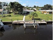 48ft dock and boat lift - Single Family Home for sale at 1345 Holiday Dr, Englewood, FL 34223 - MLS Number is C7449205