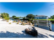 DOCK WITH WATER AND POWER - Single Family Home for sale at 3400 Colony Ct, Punta Gorda, FL 33950 - MLS Number is C7451906
