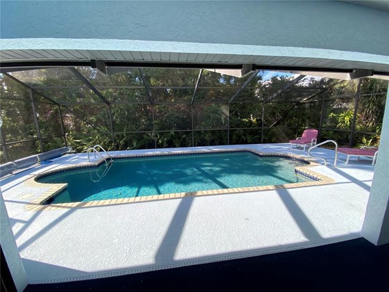 Pool area. - Single Family Home for sale at 18506 Hottelet Cir, Port Charlotte, FL 33948 - MLS Number is C7452138