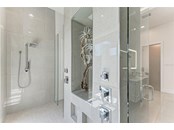 1 side of dual showers; niches for soaps & shampoos - Single Family Home for sale at 602 Regatta Way, Bradenton, FL 34208 - MLS Number is A4499642