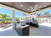 Cabana includes full outdoor kitchen, perfect for entertaining your family and friends! - Single Family Home for sale at 602 Regatta Way, Bradenton, FL 34208 - MLS Number is A4499642
