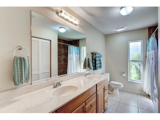 Guest bath - Single Family Home for sale at 1518 Bel Air Star Pkwy, Sarasota, FL 34240 - MLS Number is A4506654