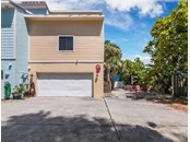 Two car garage can additional parking space. - Condo for sale at 6810 Midnight Pass Rd, Sarasota, FL 34242 - MLS Number is A4507853