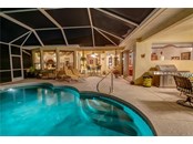 The open and airy atmosphere of your Lanai filters into your home. - Single Family Home for sale at 6521 Sundew Ct, Lakewood Ranch, FL 34202 - MLS Number is A4514104
