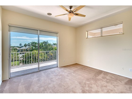 bedroom 4 with balcony - Single Family Home for sale at 113 N Polk Dr, Sarasota, FL 34236 - MLS Number is A4514338