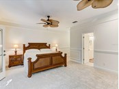 Owners bedroom suite - Single Family Home for sale at 5227 Siesta Cove Dr, Sarasota, FL 34242 - MLS Number is A4519271