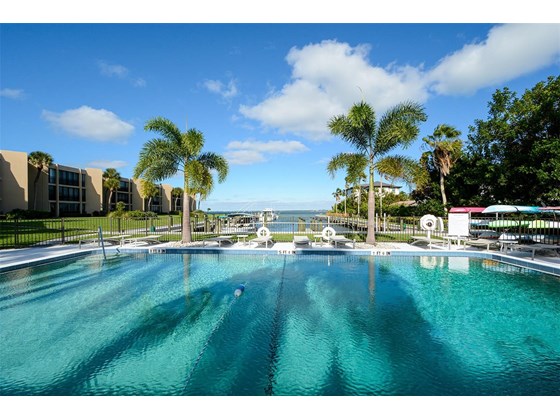 Pool, Marina and Bay;  Just one Bridge to the Gulf; Gas dock to the south - Condo for sale at 450 Gulf Of Mexico Dr #B107, Longboat Key, FL 34228 - MLS Number is A4520786