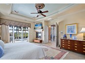 The master bedroom has full its own access to the spa for those late night dips! - Single Family Home for sale at 1012 Bayview Dr, Nokomis, FL 34275 - MLS Number is A4521028