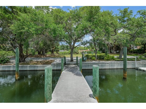 TWO Deeded Dock Slips with Power and Water Available - Single Family Home for sale at 1460 Rebecca Ln, Sarasota, FL 34231 - MLS Number is N6115705