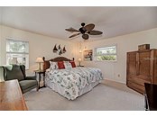 spacious guest bedroom - Single Family Home for sale at 10 Pine Ridge Way, Englewood, FL 34223 - MLS Number is N6118641