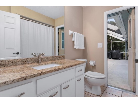 Guest/pool bathroom - Single Family Home for sale at 2823 57th Dr E, Bradenton, FL 34203 - MLS Number is N6119097